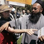 Voor- en tegenstanders van het gebruik van shari'a tijdens een demonstratie in Toronto (foto CP).
